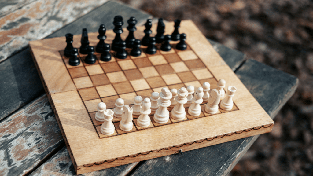 A chess board on a wooden table