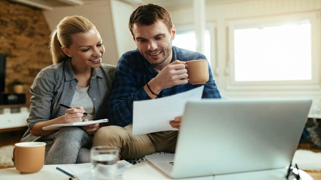 A couple looking at their bills