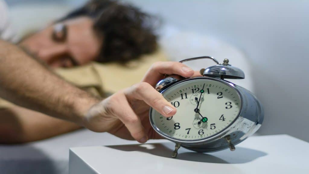 A man waking up at 5