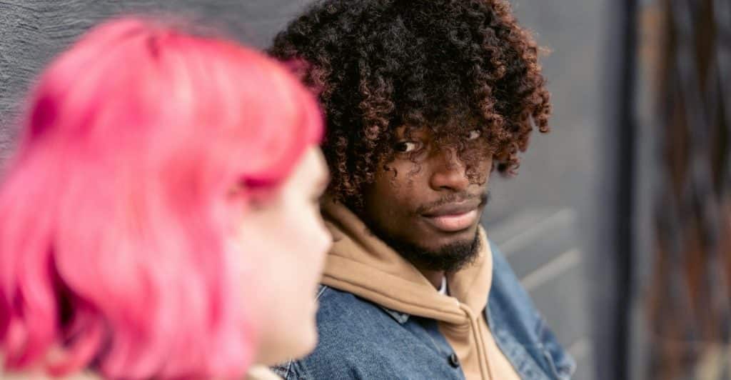 A man looking at the woman