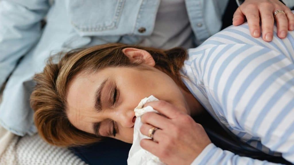 A crying woman being comforted