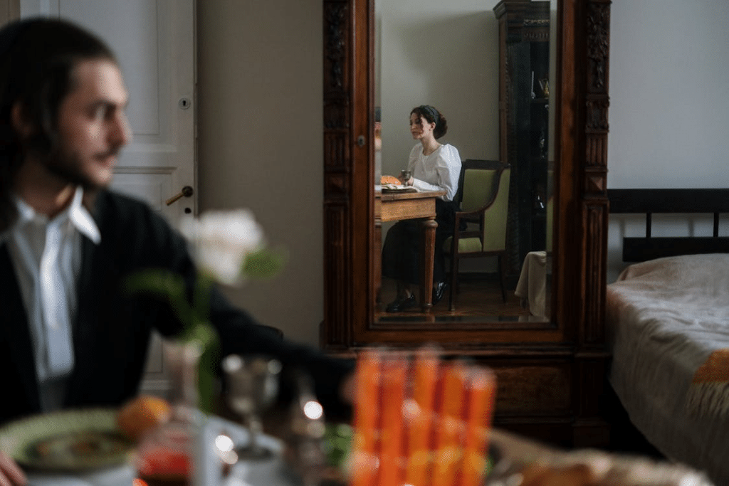 Man and Woman Sitting at the Table
