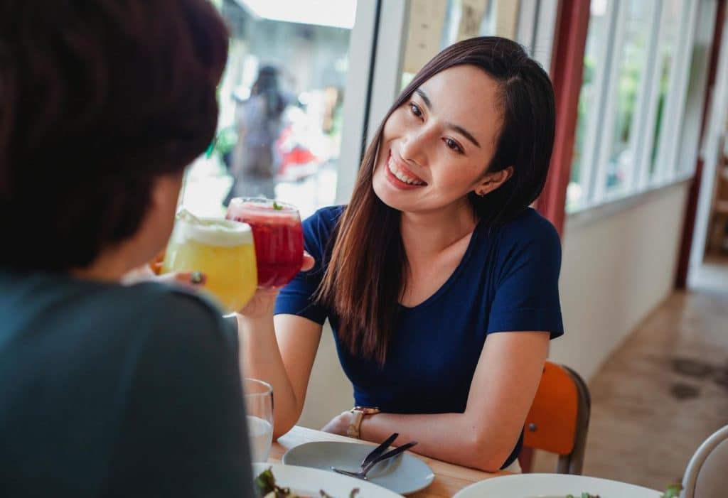 A man and woman smiling at each other