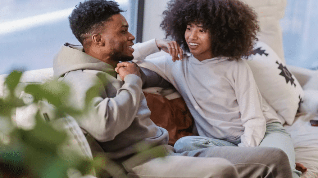 A couple talking on the couch