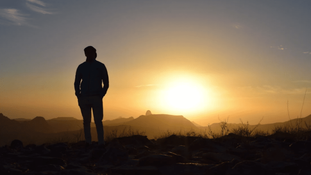 A man watching the sunset