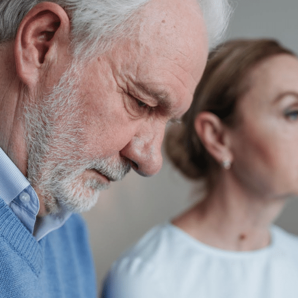 An Elderly Couple Faces of Grief
