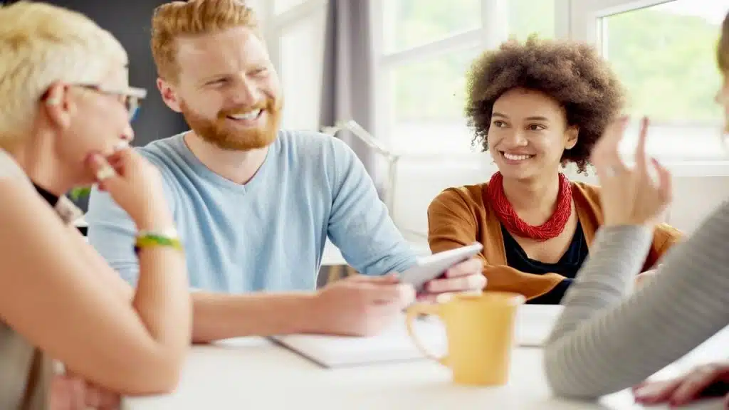 Colleagues smiling at each other