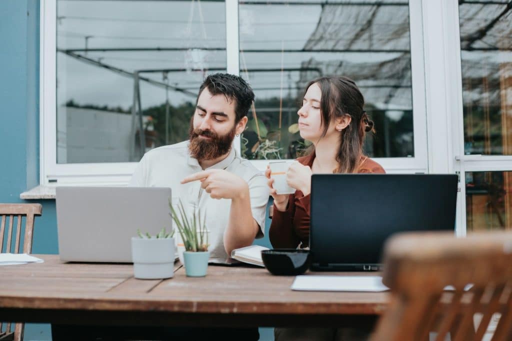 A man asking the opinion of a woman