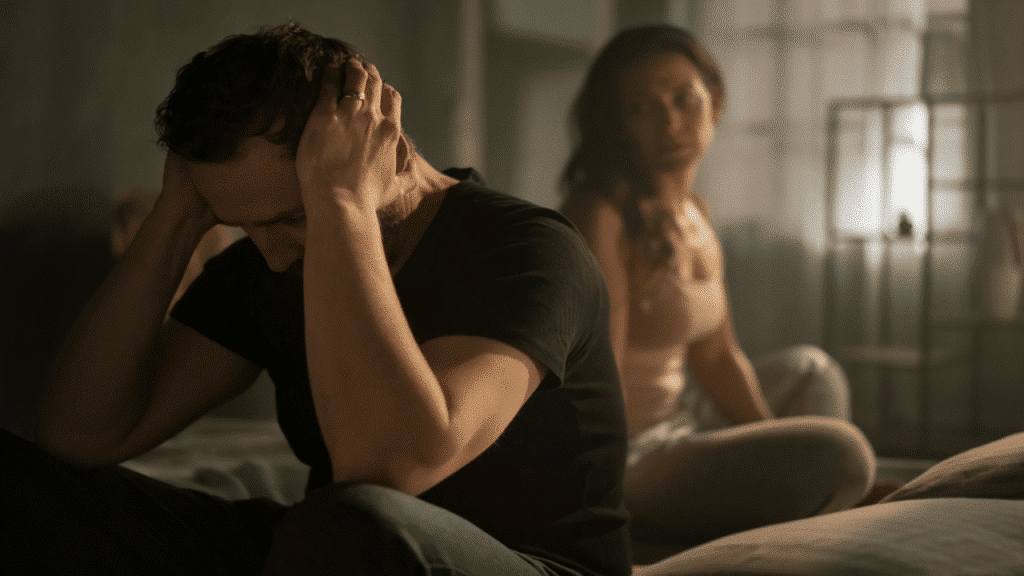 A couple fighting in the bedroom