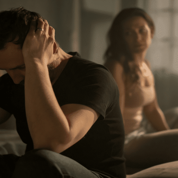 A couple fighting in the bedroom