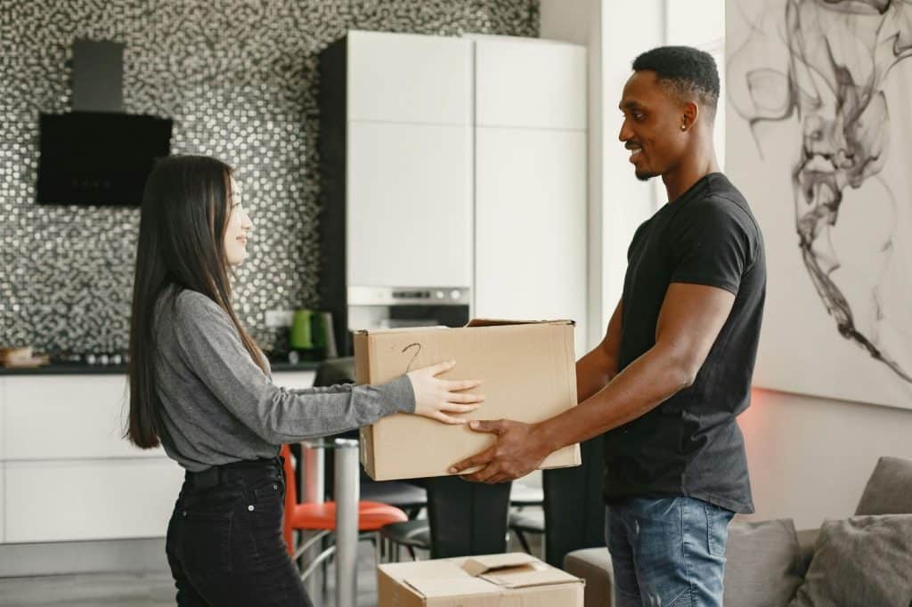A man and woman facing each other