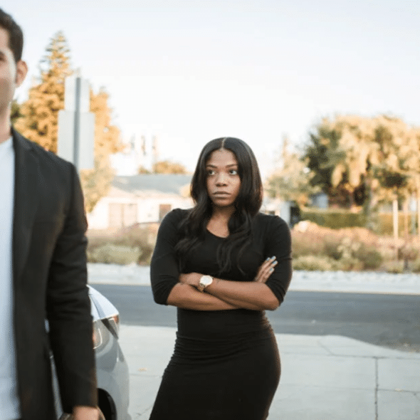 A woman looking upset at her husband