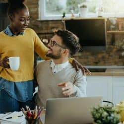 A man and woman looking at each other