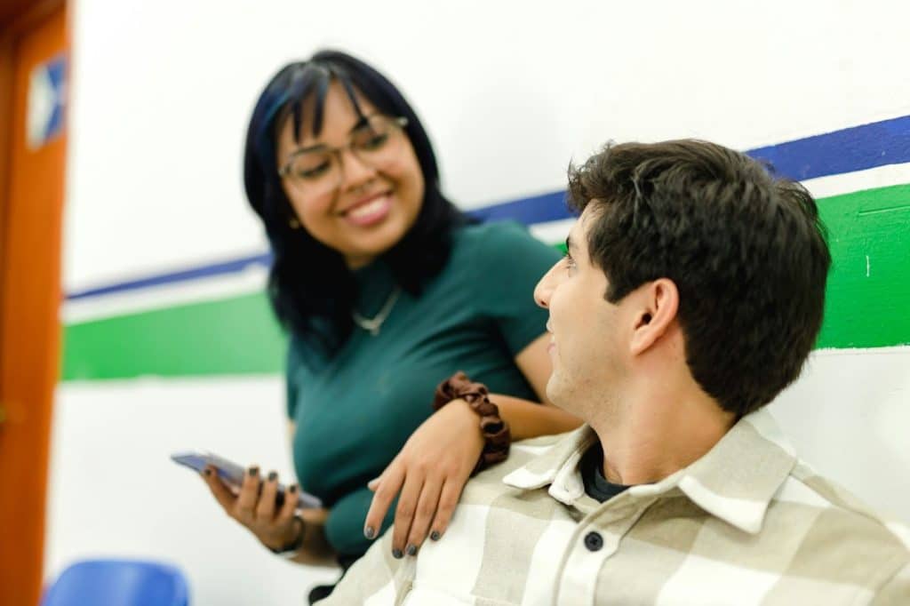 A man looking at the woman