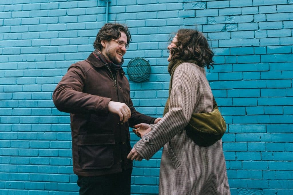 A man and woman talking