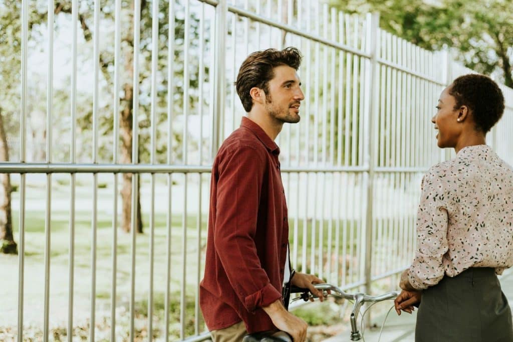 A man and woman outside the park