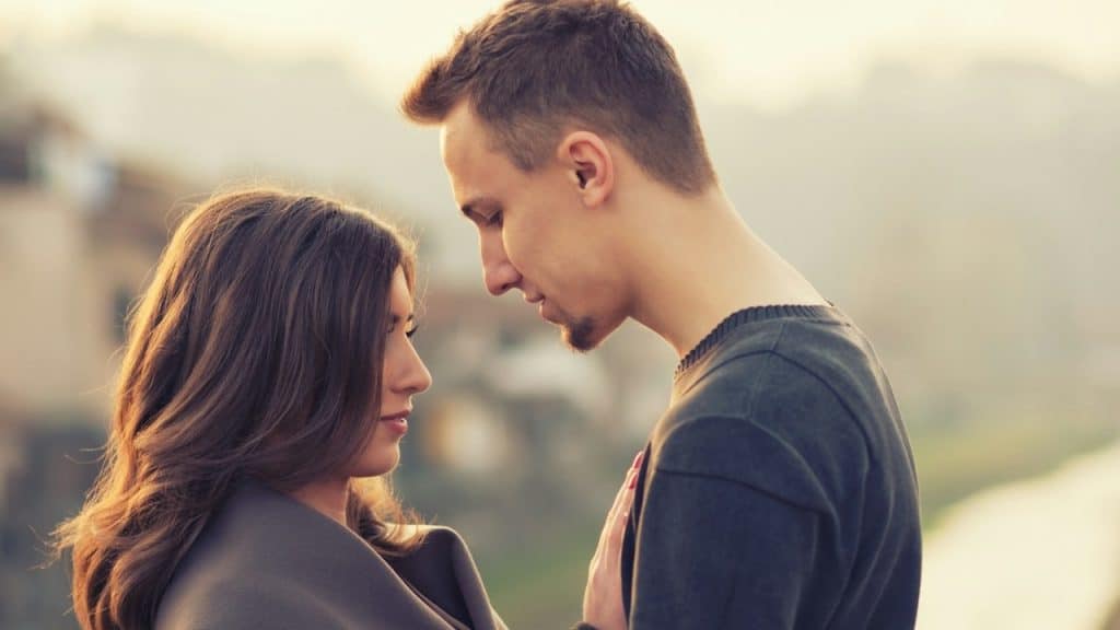 A man looking at a woman