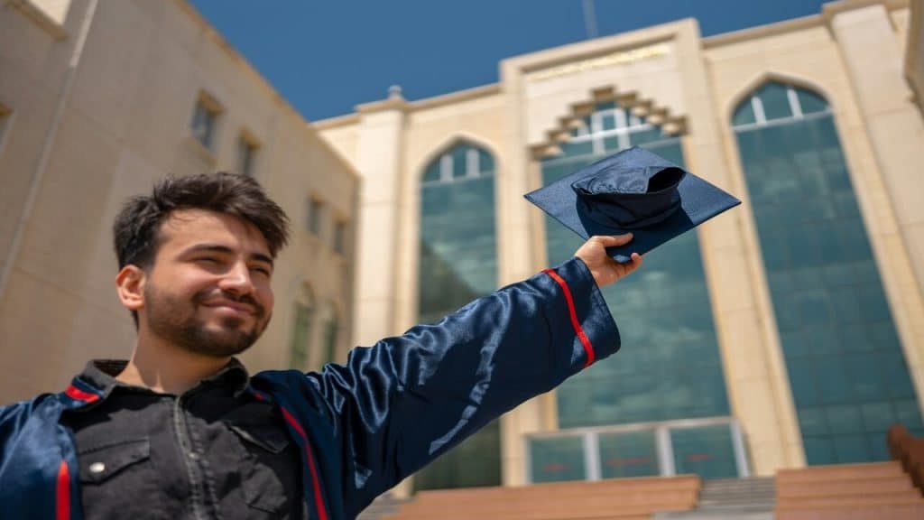 A man celebrating his graduation