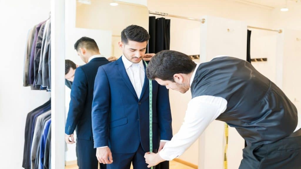 A man being fitted for a suit 