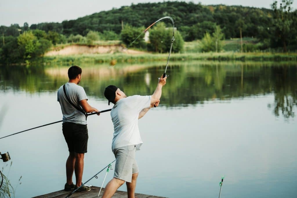 The two men are fishing.
