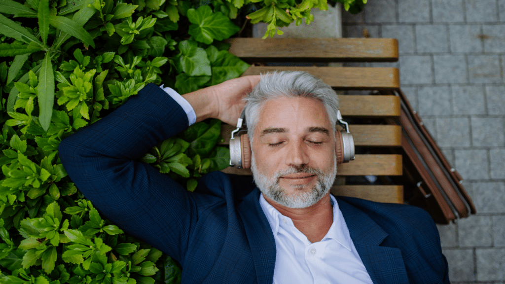 A man relaxing on a bench