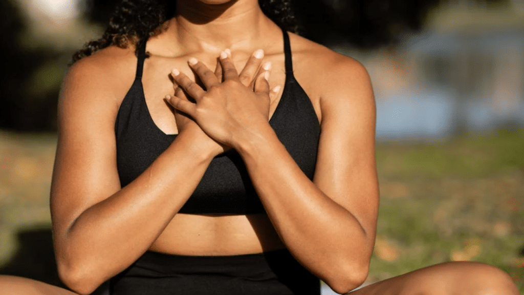 A woman doing breathing exercises