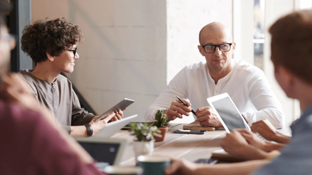 A man leading a business meeting