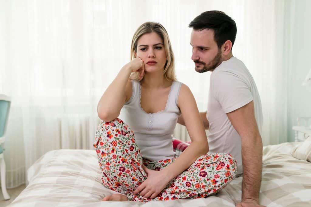 A man and woman arguing