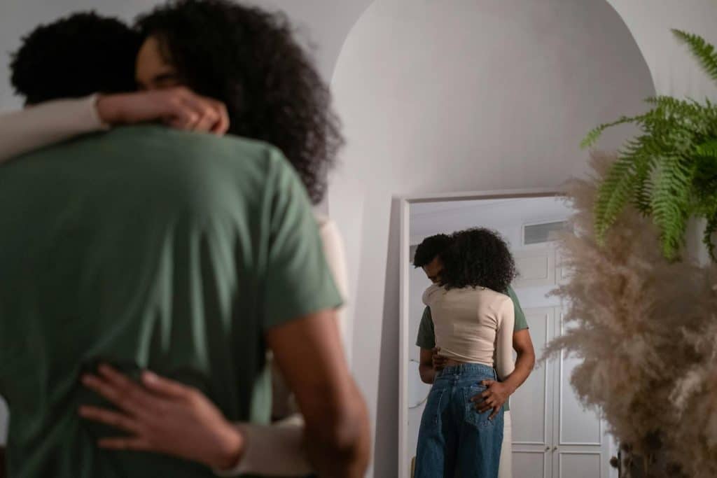 A couple hugging each other.