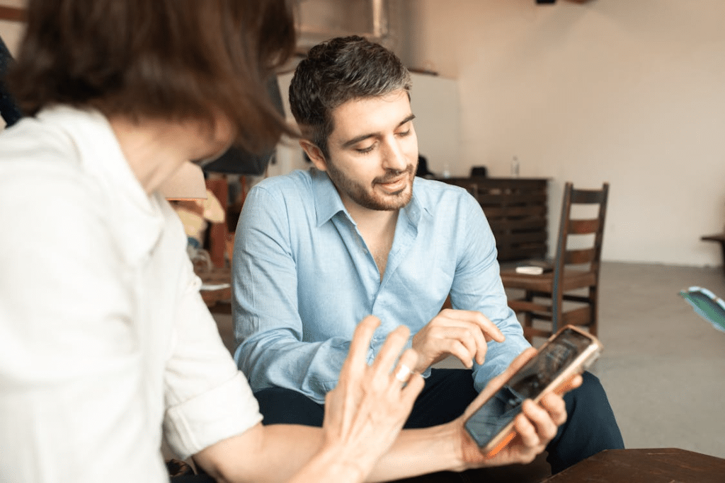Man and Woman With Smartphone