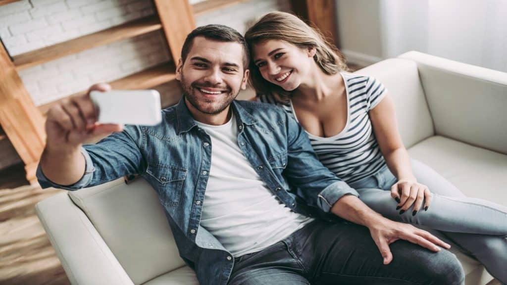 A couple taking a selfie