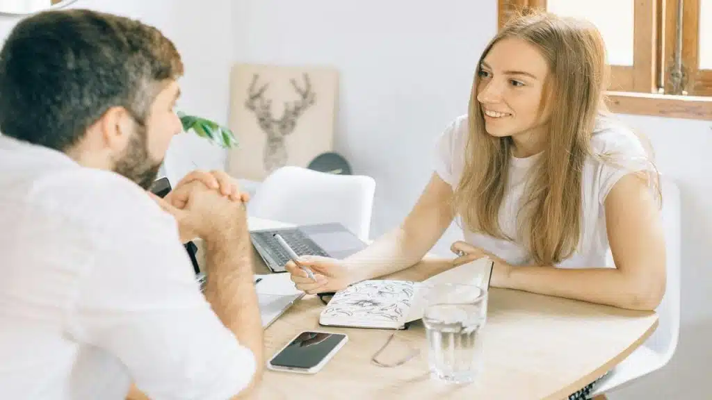 A couple talking at home