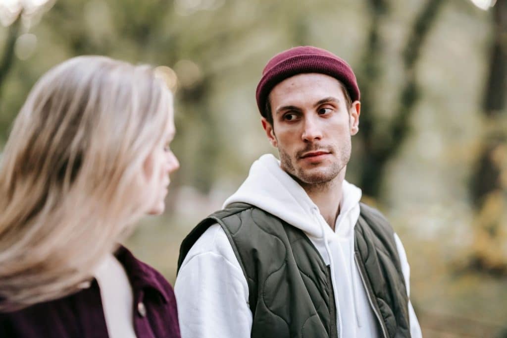 A man looking at the woman