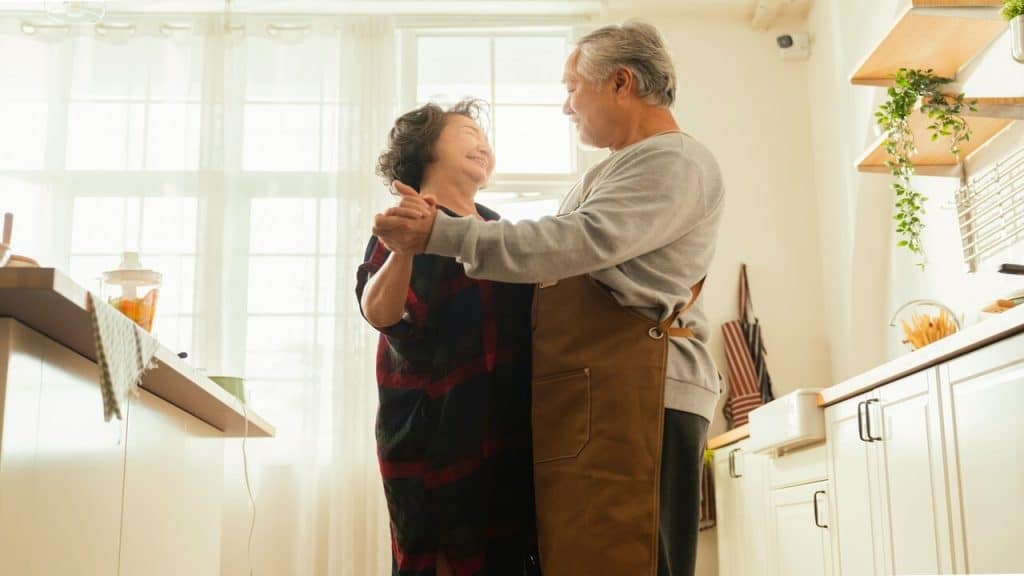 A couple dancing in the kitchen