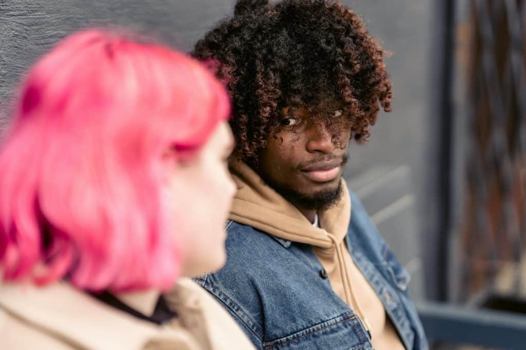 A man looking at the woman 