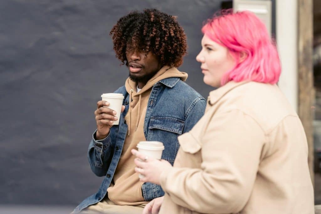 A man and woman having a coffee 