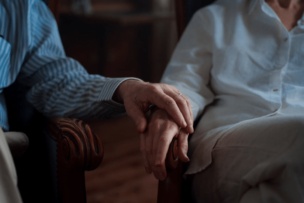 Man Holding Woman's Hand