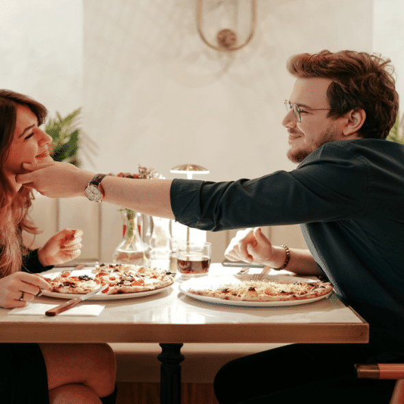 A couple during a pizza date