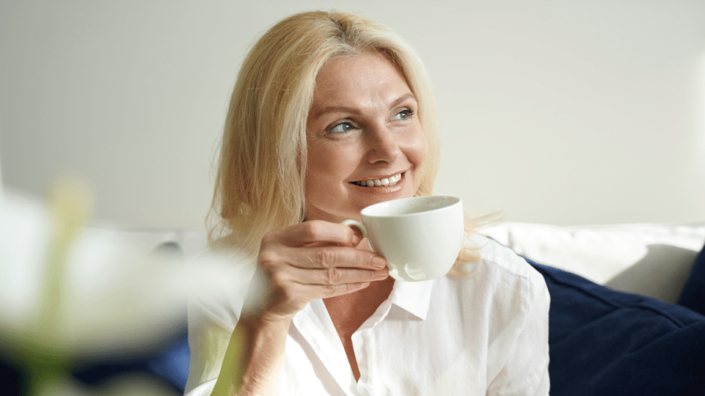 A woman enjoying her coffee