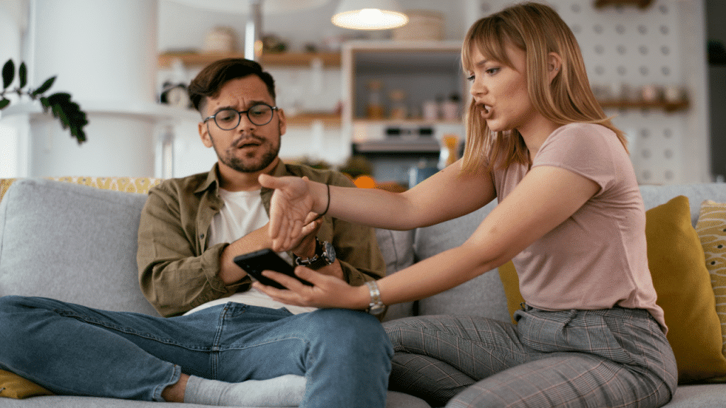 A woman confronting her husband about something