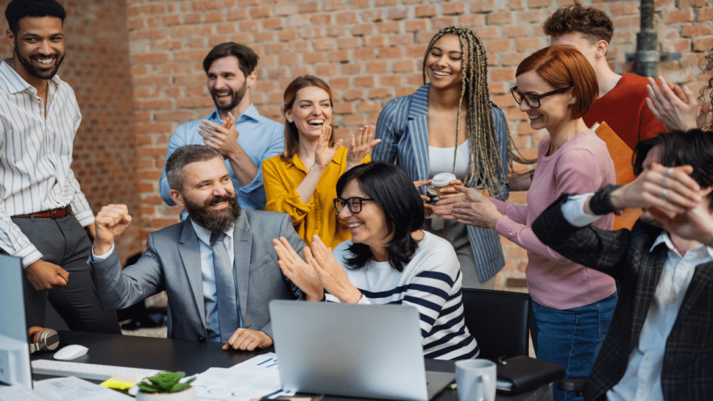 Colleagues celebrating at work