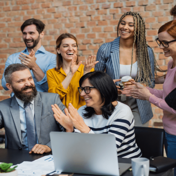 Colleagues celebrating at work