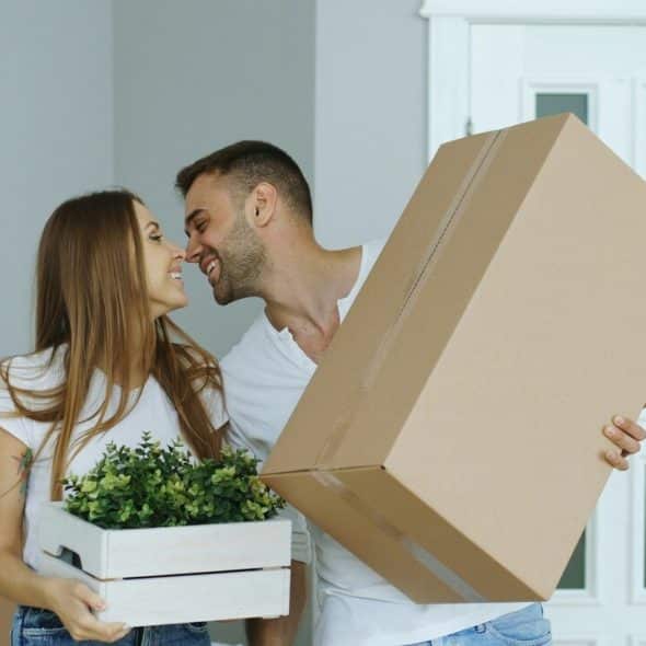 A couple moving into a new home
