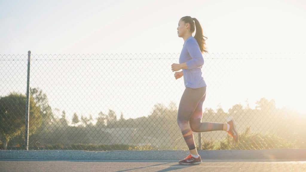 A woman jogging by herself