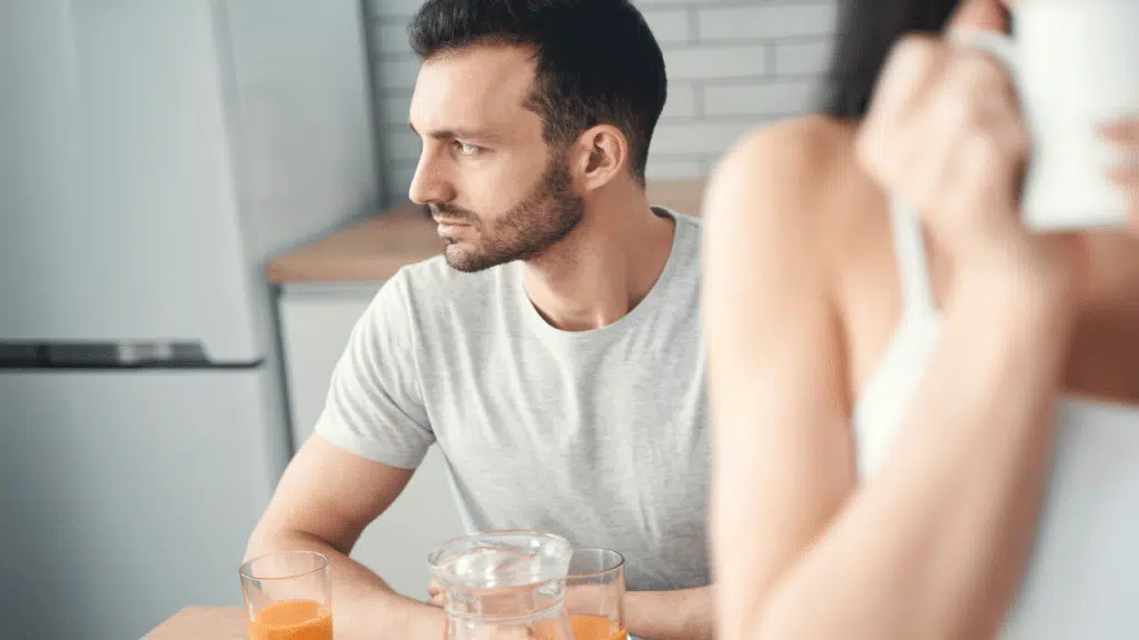 A man looking pensive during breakfast