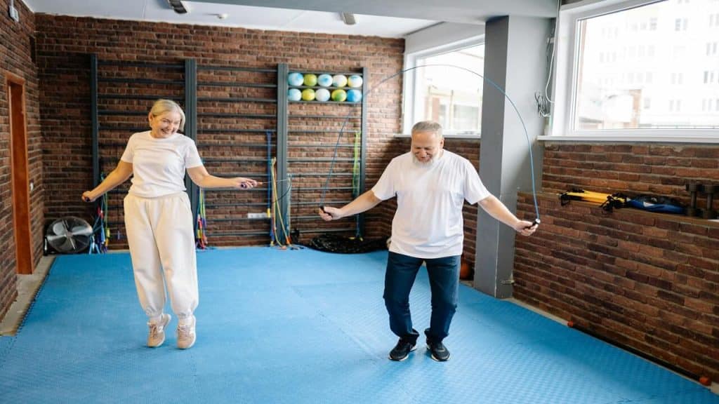A couple doing jump rope together