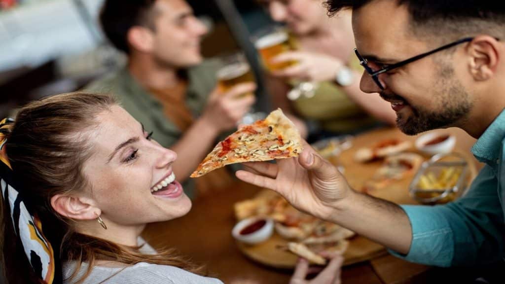 A couple having a meal with friends