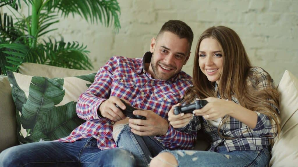 A couple playing video games together