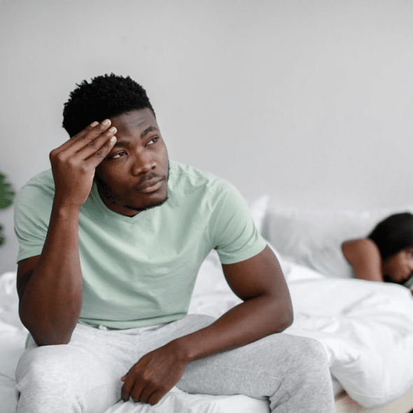 A couple arguing in the bedroom