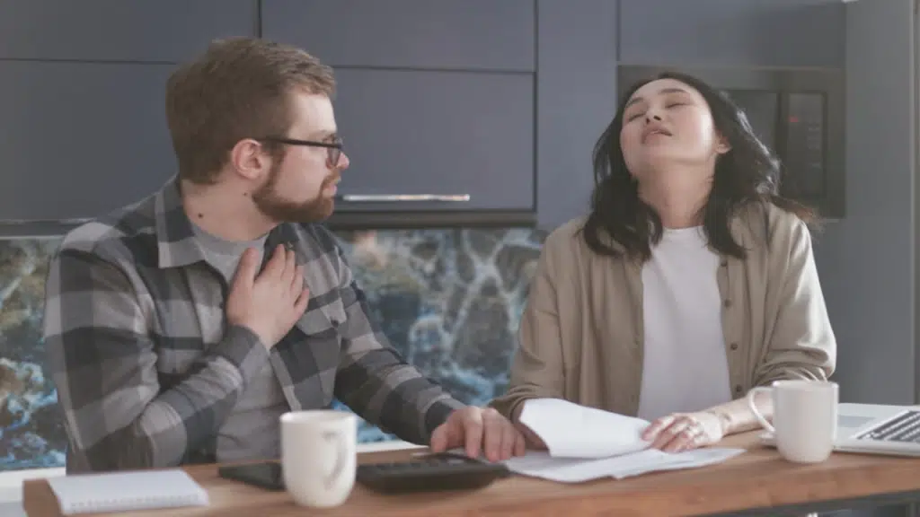 A couple having a disagreement about the bills